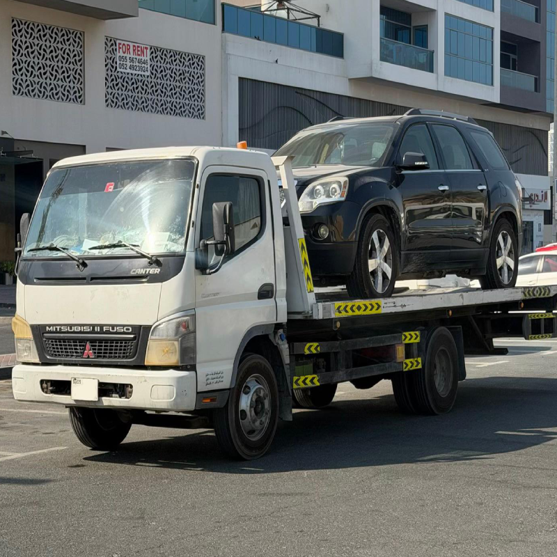 Vehicle towing truck providing car towing service in Dubai